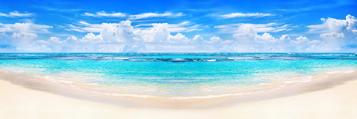Beautiful tropical beach panorama, exotic island landscape, turquoise sea water, ocean waves, yellow sand, blue sunny sky, white clouds, hot summer holidays, vacation, Caribbean travel, Maldives view