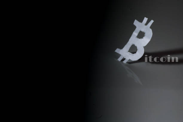 istock bitcoin b written on paper with black background 1324456545