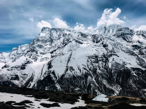 istock Snow covered mountains and beautiful sky at Nepal. 1324459105