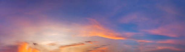 istock Dramatic panorama sky with cloud on sunrise and sunset time. 1324465079