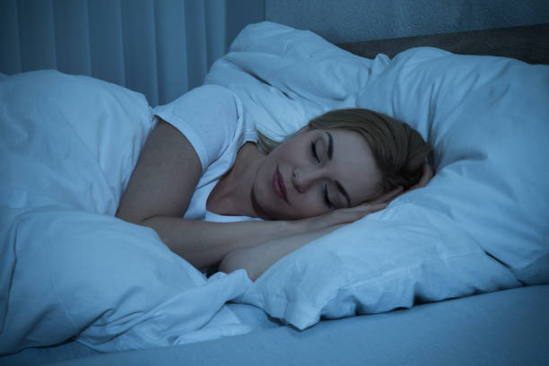 istock Woman Sleeping In Bed 1324470416