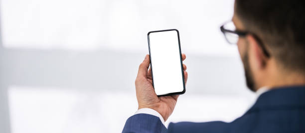 istock Man Holding Mobile Phone 1324470774