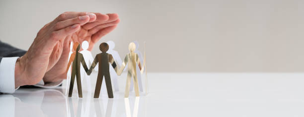 istock Boss Protecting Business Employees 1324471695