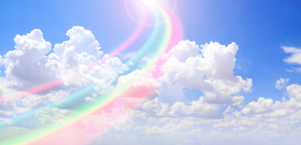 istock Horizontal nature banner with blue sky, pretty clouds and rainbow 1324477799