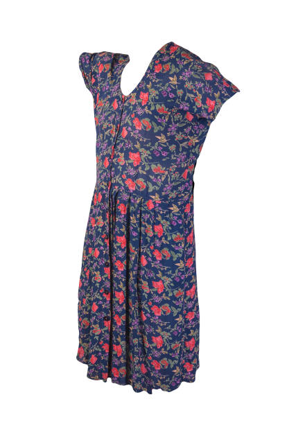 istock female summer dress with buttons isolated on white background. 1324479734