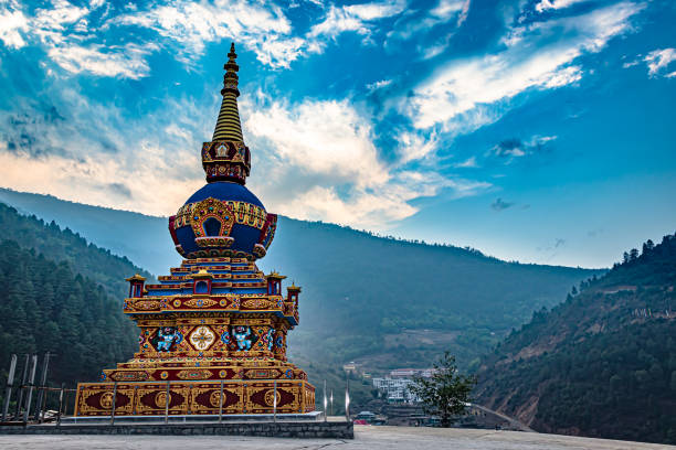 istock buddhist stupa with bright blue sky and mountain background at morning from flat angle 1324487349