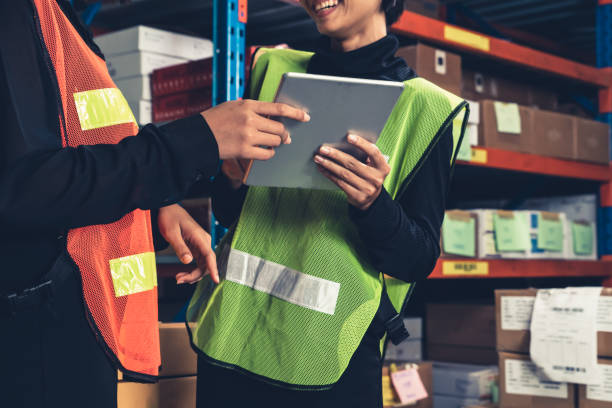 istock Female warehouse worker working at the storehouse 1324488119