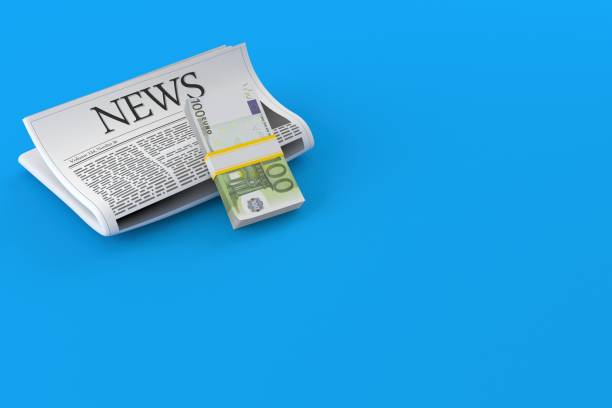 istock Euro currency with newspaper 1324488389