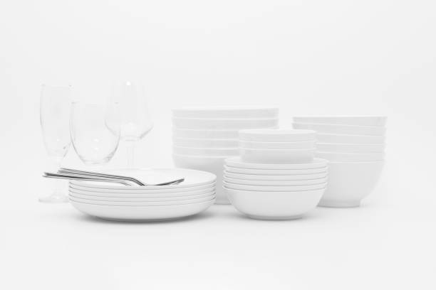 istock set clean dishes glasses on white background 1324488537