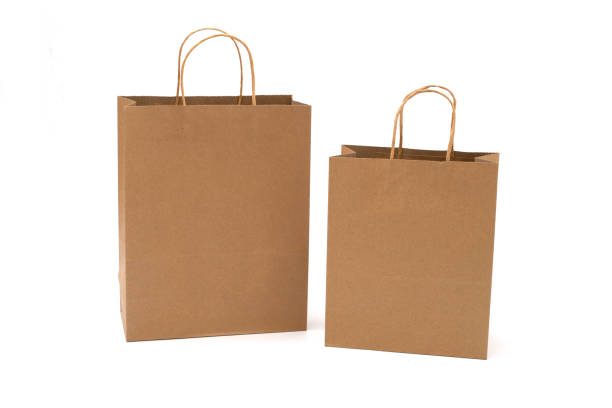 istock recycled paper shopping bags on white background 1324488556
