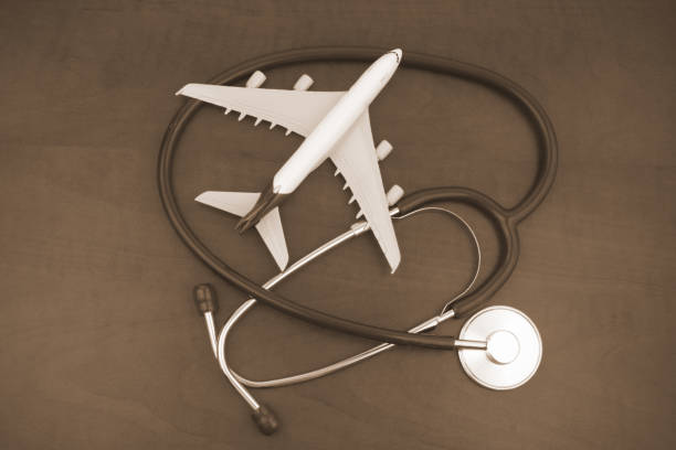 istock Airplane model and stethoscope close up. 1324490377