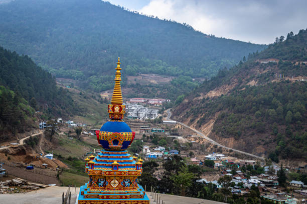 istock Buddhist stupa with himalayan mountain background at morning from top angle 1324491973
