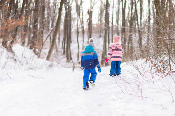 istock Children having fun on the snow 1324492863
