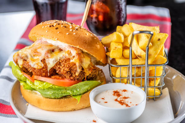 istock A chicken parma burger with lettuce and tomato 1324496041