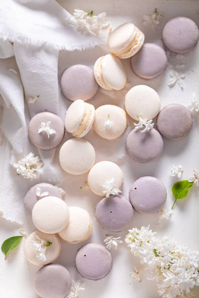 istock Unique macaroons of flower flavour. Creative dessert compositions. 1324497875