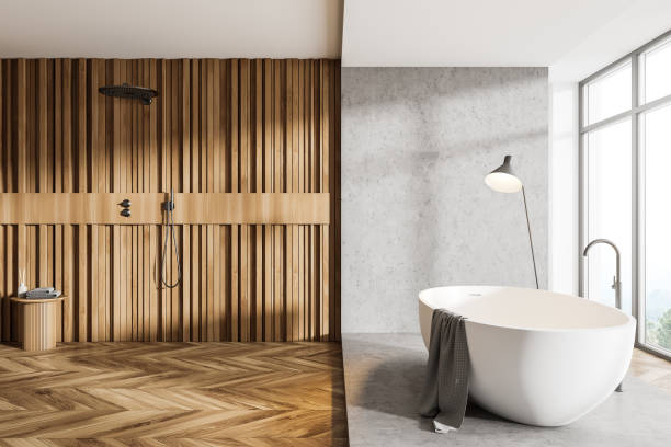istock Bathroom interior with bathtub and shower with view on countryside 1324499102