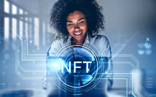 Attractive African American businesswoman working on laptop, non-fungible token hologram, nft with network circuit and globe. Concept of crypto art and technology Attractive African American businesswoman working on laptop, non-fungible token hologram, nft with network circuit and globe. Concept of crypto art and technology non fungible token photos stock pictures, royalty-free photos & images