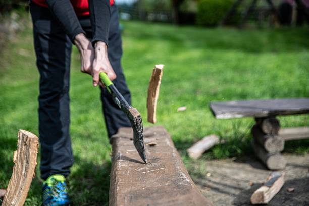 istock Man or lumberjack chopping wood for winter. 1324502060