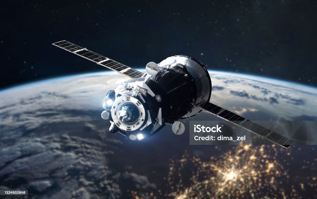 Spaceship on orbit of planet Earth. View from ISS station. Exploration of solar system. Sci-fi wallpaper. Elements of this image furnished by NASA Spaceship on orbit of planet Earth. View from ISS station. Exploration of solar system. Sci-fi wallpaper. Elements of this image furnished by NASA (url: https://www.nasa.gov/sites/default/files/thumbnails/image/iss058e029952.jpg https://eoimages.gsfc.nasa.gov/images/imagerecords/85000/85307/iss042e160966_front.jpg) Satellite Stock Photo