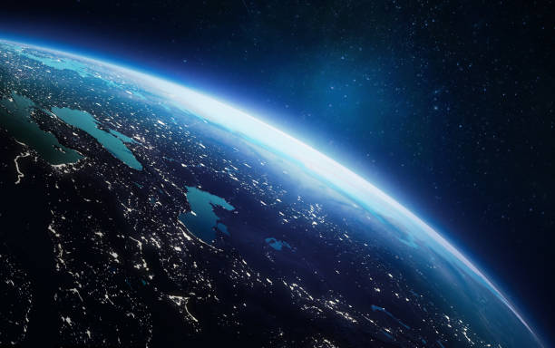 istock Surface of Earth planet in deep space. Outer dark space wallpaper. Night on planet with cities lights. View from orbit. Earth hour. Elements of this image furnished by NASA 1324502849