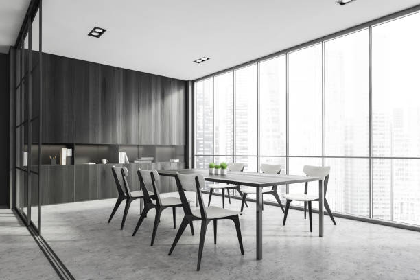 istock Interior design modern meeting room with panoramic windows. Contemporary conference board table. Concrete floor. Cityscape view. 1324502862