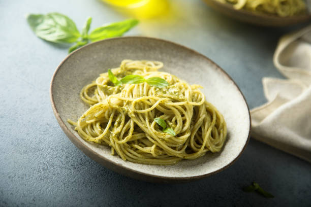 istock Pasta with pesto sauce 1324504221