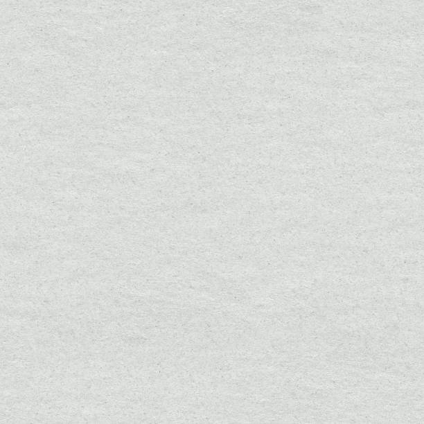 istock White paper  textute with small silver particles. Seamless square background, tile ready. 1324506375