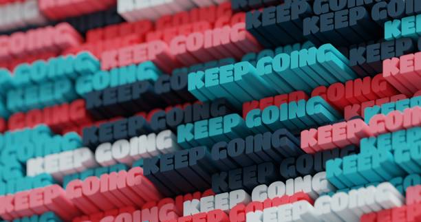 istock 3D Keep Going. Abstract typographic 3D lettering background. Modern bright trendy motivational word pattern in gray pink, graphite and blue colors. Contemporary cover and backdrop 1324506494