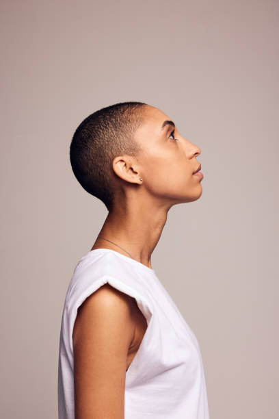 istock Woman in casuals with shaved head 1324509687
