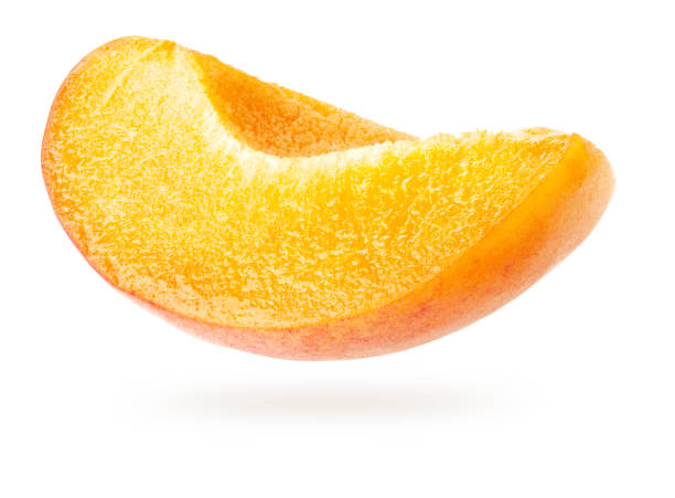 istock Apricot slice isolated on white background with clipping path 1324509916