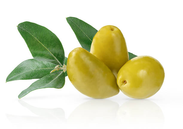 istock Green olives with leaves 1324512373