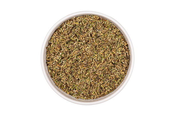 istock rosemary in a bowl on white background isolated 1324512693