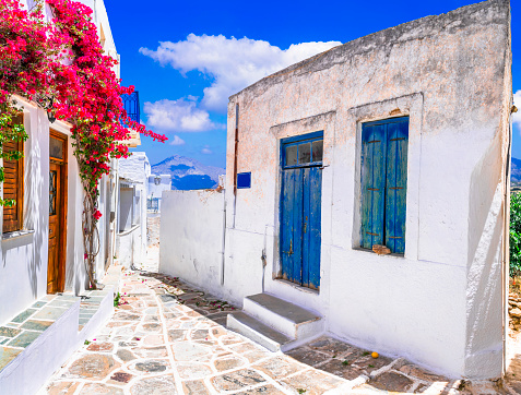 Greece, Cyclades. Beautiful Lefkes traditional greek village in Paros island. typical whitewashed houses and floral narrow streets.