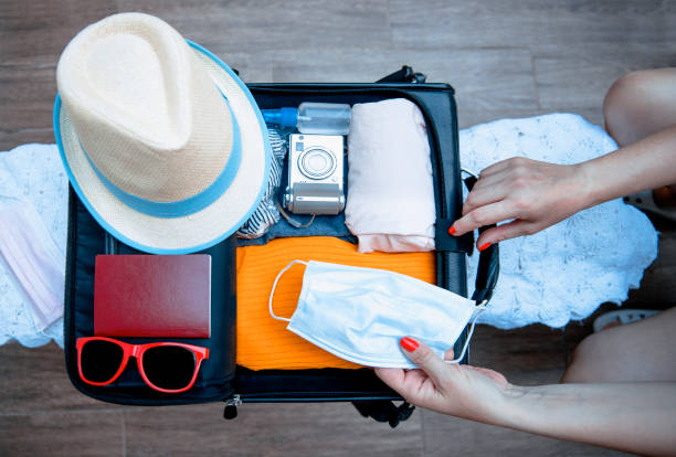 istock Packing for short vacation during Coronavirus pandemic 1324514840