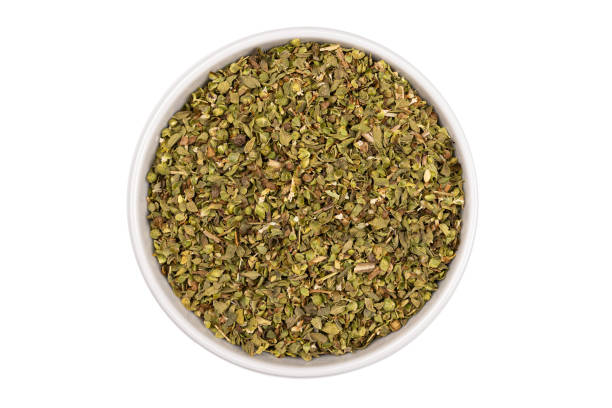istock thyme seasoning spice in bowl on white background 1324515471