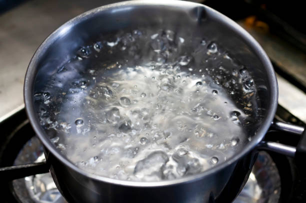istock Boiling water in stainless pan in kitchen 1324515862