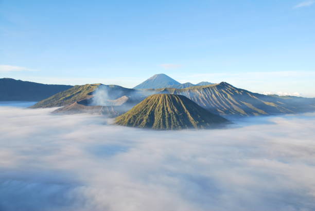 istock Bromo Mountain and fog around bromo mountain with sunrise from seruni viewpoint is an active volcano and part of the Tengger massif, in East Java, Indonesia. Indonesian call Gunung Bromo. Blue nature 1324517069