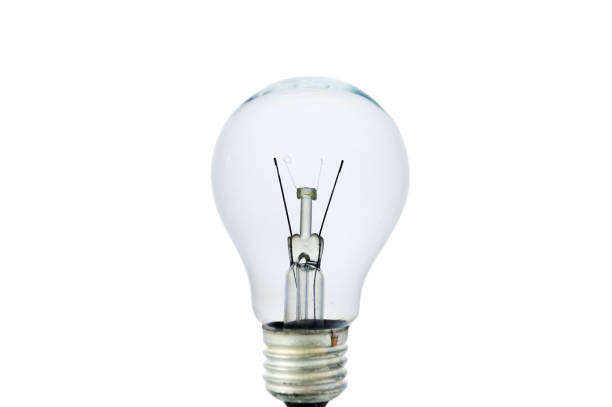 istock Burnt out light bulb isolated on white background. 1324519423