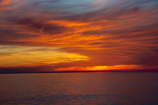 istock Beautiful dusk sea and orange sky 1324524968