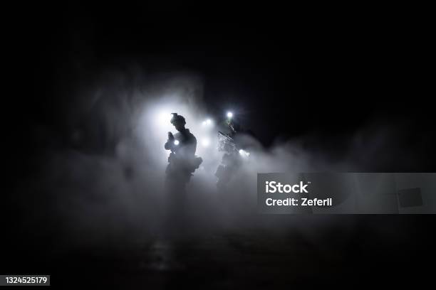 Antiriot Police Give Signal To Be Ready Government Power Concept Police In Action Smoke On A Dark Background With Lights Blue Red Flashing Sirens Dictatorship Power Stock Photo - Download Image Now