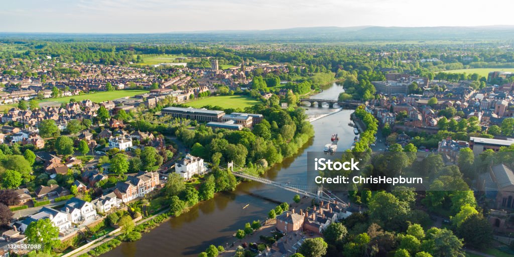 Aerial view of River Dee in Chester including Queens Park Bridge and The Old Dee Bridge, Cheshire, England, UK Aerial view of River Dee in Chester at dusk including Queens Park Bridge and The Old Dee Bridge, Cheshire, England, UK UK Stock Photo