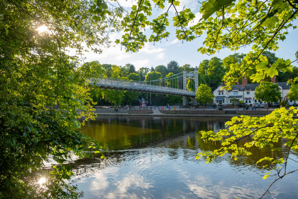 queen's park bridge, river dee, chester, england, uk - chester england dee river suspension bridge bridge imagens e fotografias de stock