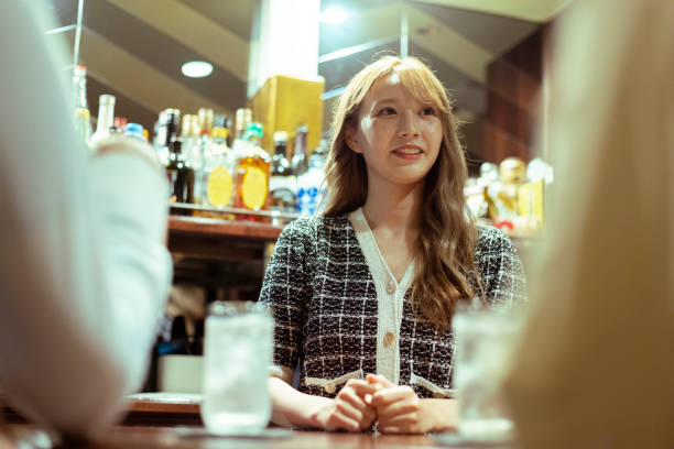 istock Young woman providing alcohol at the bar 1324537837