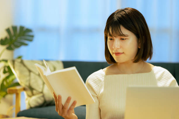 istock Young woman in learning online in living 1324537872
