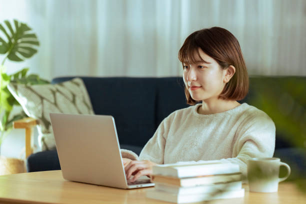 istock Young woman in learning online in living 1324537976