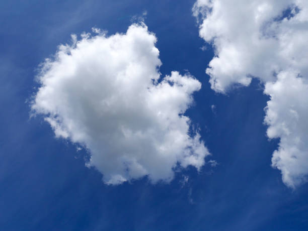 istock Blue sky and white clouds in summer. Bright and colorful 1324542293