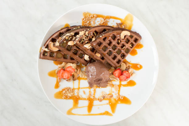 istock Chocolate Waffles With Strawberry and Cashew Nuts 1324547090