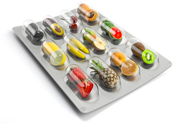 multivitamins and dietary natural supplements for a healthy diet. fruits in pills on blister pack. - blister pack pill medicine healthcare and medicine imagens e fotografias de stock