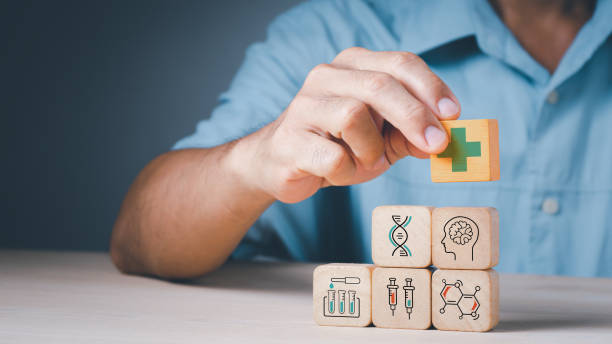 istock Doctor's hand stack woods block step on table with health care and medical icon,concept is Online and medical consultation, Virtual hospital. 1324548027