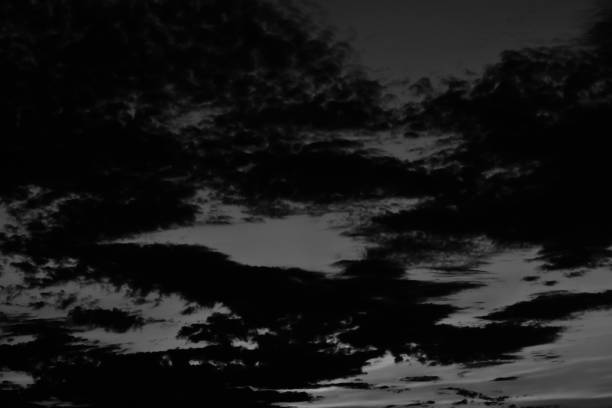 istock Dark black and white cloudy sky unique photo 1324549028